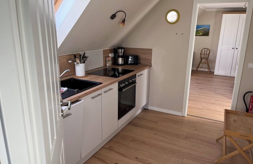 Spiekeroog Apartment | Charming apartment for 2 persons in the house Seeschwalbe up de Dün at TRANPAD 9