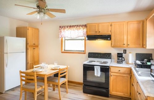Cosby Cottage | Charming Cottage Right On Cosby Creek! Enjoy the waterfall from the porch!