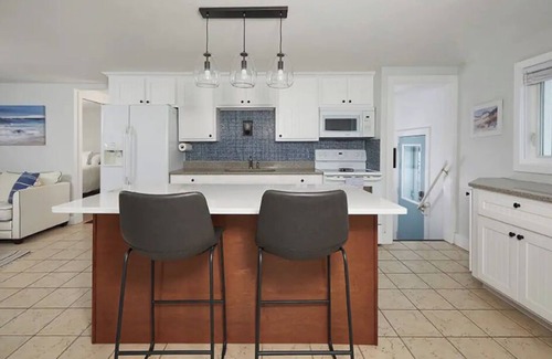 Mears Cottage | Charming Cottage with 180 degree views of Lk Michigan- short walk to sand dunes