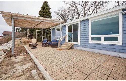 Mears Cottage | Charming Cottage with 180 degree views of Lk Michigan- short walk to sand dunes