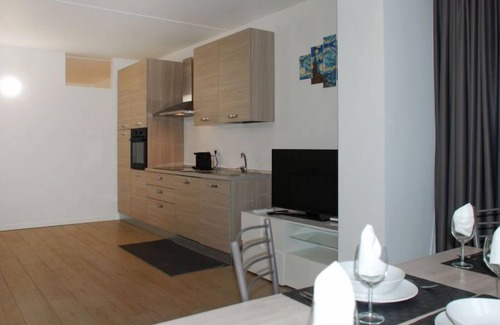 Bissone Apartment | Charming Gardenview App. 105 by Interhome