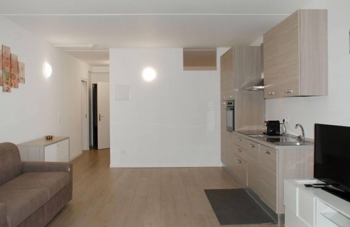 Bissone Apartment | Charming Gardenview App. 105 by Interhome