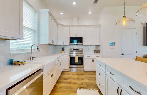 Pointe San Luis House | Charming home w/shared pool, nearby beach, & covered patio with bay views