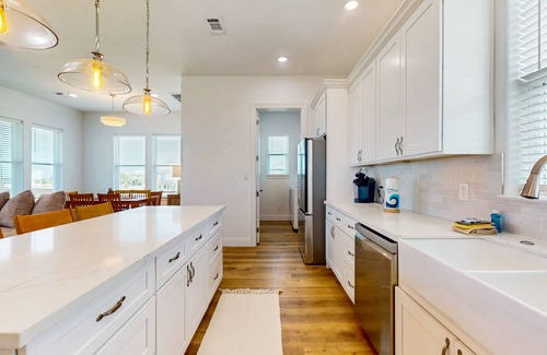 Pointe San Luis House | Charming home w/shared pool, nearby beach, & covered patio with bay views