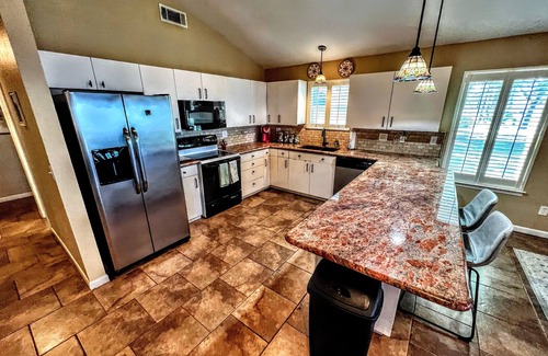 Leisure Land House | Charming Lake House Retreat with Private Dock & Expansive Covered Porch