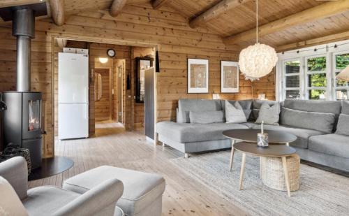 Bøtø By House | Charming Log Cabin Near The Sea