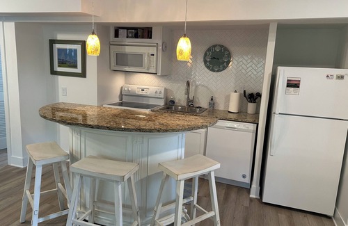 West Beach Village Villa | Charming lower level 1-bedroom Seascape villa just steps from the beach!