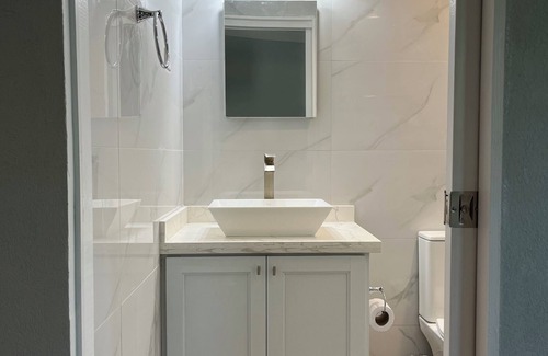 Ealing Grove Apartment | Charming & Modern 356 sq ft studio with AC near Oistins/Surfing/Beaches/Airport.
