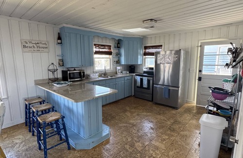 Ocean Isle Beach House | Charming oceanfront cottage, pet friendly, private walkway to the beach