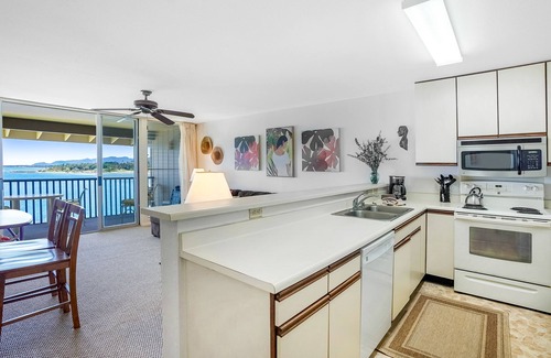 Wailua House Lots Condo | Charming Oceanfront Top Floor Condo at Wailua Bay with Stunning Views and Local Fisherman Sightings!