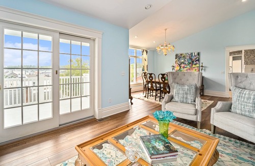 Harbor Springs Condo | Charming penthouse with two balconies & harbor views