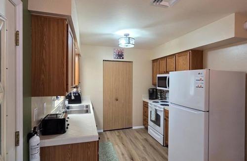 Eagar Cabin | Charming remodeled family cabin room for 8 nestled in the woods & near lakes