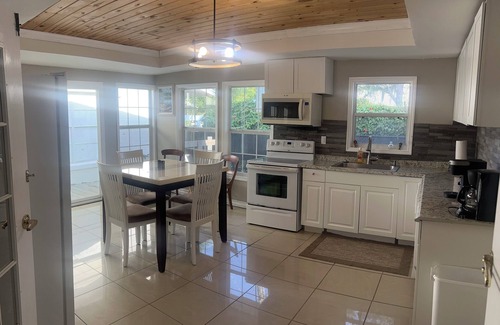 New Smyrna Beach House | Charming Riverside Bungalow-Pet Friendly