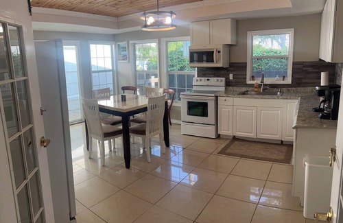 New Smyrna Beach House | Charming Riverside Bungalow-Pet Friendly