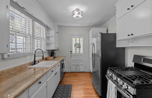 Rosewood House | Charming Rosewood bungalow with incredible backyard oasis with in-ground pool.
