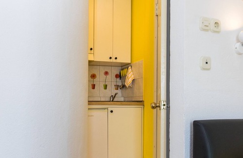 Kastel Kambelovac Apartment | Charming Seafront Apartment Yellow, steps away from the Adriatic Sea