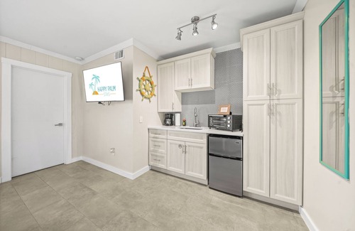 Orlando Beach Condo | Charming Studio Suite- Steps from Private Beach Access, Fire Pit, & BBQ Grills