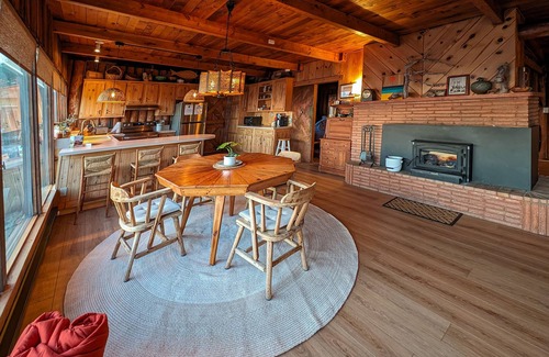 Oak Harbor House | Charming water view retreat with a wood-burning fireplace, deck, grill, and W/D