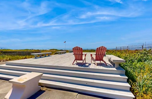 Oak Harbor House | Charming water view retreat with a wood-burning fireplace, deck, grill, and W/D