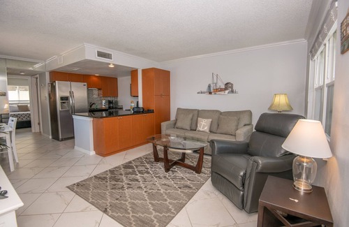 Treasure Island Condo | Charming Waterfront Retreat—Dock & Courtyard