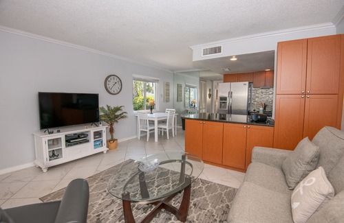 Treasure Island Condo | Charming Waterfront Retreat—Dock & Courtyard