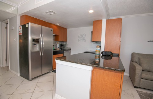 Treasure Island Condo | Charming Waterfront Retreat—Dock & Courtyard