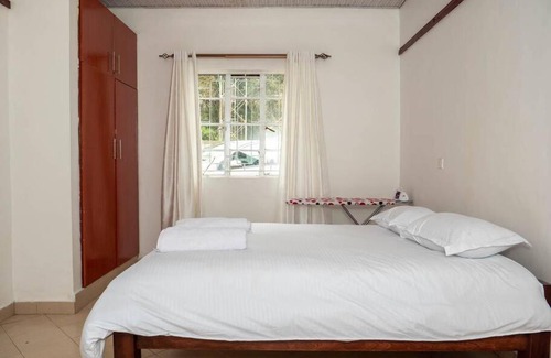 Nairobi Villa | Cheerful 2-bed cottage on forest edge.