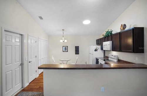 Buttonwood Villa | Cheerful 2 Bedroom Villa with Golf Cart and a GREAT Location!