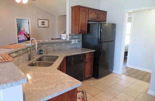Southaven House | Cheerful 4 Bedroom with indoor fireplce, Fence in yard, Screen in back deck,