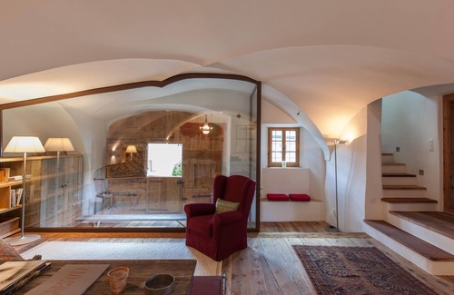 La Punt-Chamues-ch Apartment | Ches'Ota: Historic Engadine House with Garden and Modern Flair