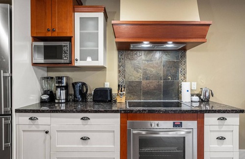 Canmore Apartment | Chic 1BR Mountain Suite | King Bed + Pool