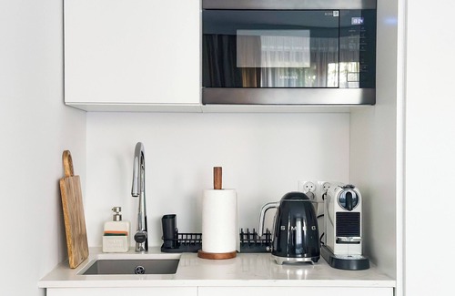 Targowek Apartment | Chic corporate apartment steps from Metro Zacisze, with WiFi and free parking