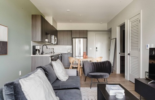 Squire Park Apartment | Chic First Hill 1BR w/Roof Lounge & Bike Storage, by Blueground
