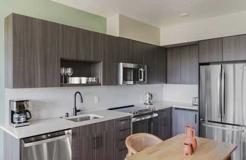 Squire Park Apartment | Chic First Hill 1BR w/Roof Lounge & Bike Storage, by Blueground