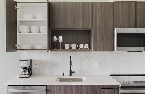 Squire Park Apartment | Chic First Hill 1BR w/Roof Lounge & Bike Storage, by Blueground