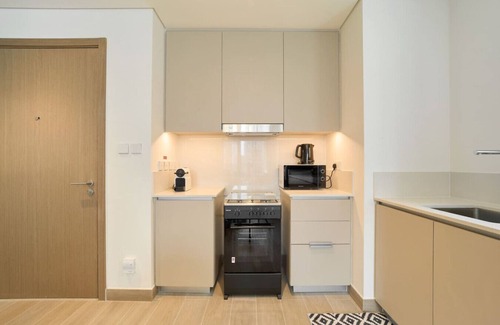 Dubai Apartment | Chic & Sunny 1BR Escape | Grove Creek Beach Access