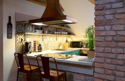 Prague 1 Apartment | Chill in a Hanging Chair at an Old Town Bohemian Loft