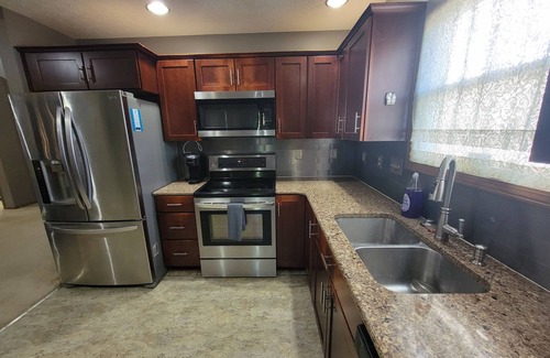 Summit Station House | Circle of Comfort 3-bedroom house in Columbus with WiFi, AC