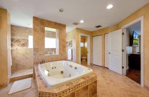 Parkland House | City Oasis is a Gorgeous Home with a Pond, Pool table, Poker, and Heated Pool!