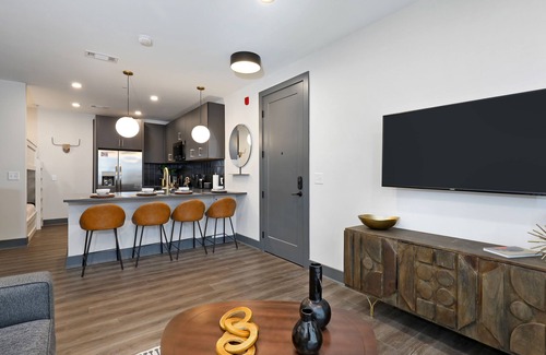 Rolling Mill Hill Condo | City-view condo with rooftop lounge, gym, & 10-minute walk to downtown