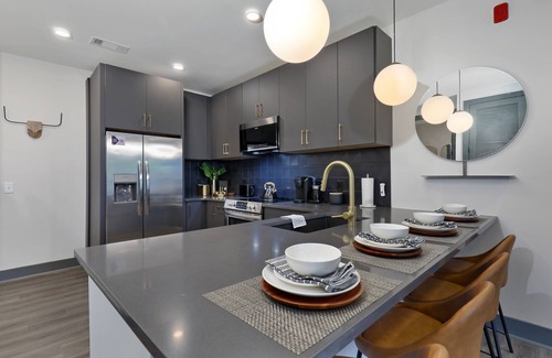 Rolling Mill Hill Condo | City-view condo with rooftop lounge, gym, & 10-minute walk to downtown