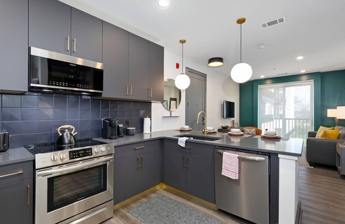 Rolling Mill Hill Condo | City-view condo with rooftop lounge, gym, & 10-minute walk to downtown