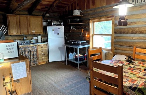 Gulnare House | CJs Ranch RV and Tent sites, with Log Cabin