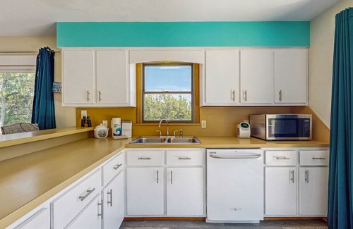Brigands' Bay House | Classic home with sound & marsh views, hot tub, decks - near beaches/lighthouse