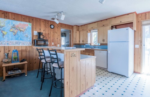 Waldport House | Classic Oregon Beach Home has private Deck, Fenced Yard, Fire Pit, and Hot Tub