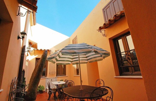 Porto Palo Apartment | Claudette by Charlotte House