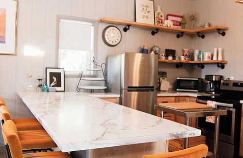 Kerr House | Clean and cozy barn home nestled in the trees with peaceful outdoor spaces!