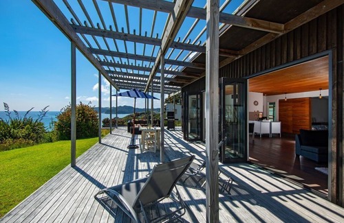 Langs Beach House | Clifftop Castle - Langs Beach Holiday Home