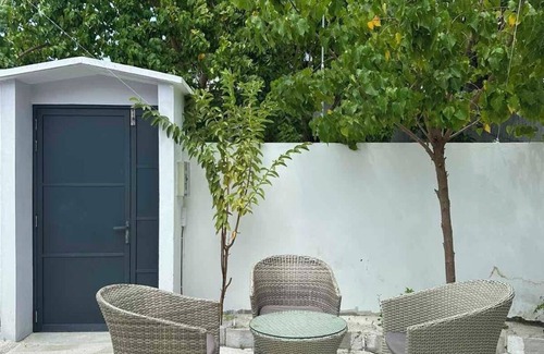 Thulusdhoo Island House | Close to the island's best spots, withncozy rooms and peaceful outdoor spaces.