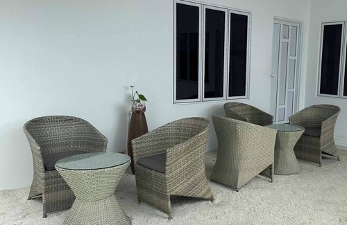 Thulusdhoo Island House | Close to the island's best spots, withncozy rooms and peaceful outdoor spaces.